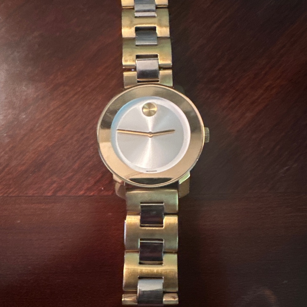 Movado bold watch/comes with original box